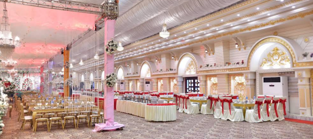 Elegant indoor wedding hall at Deewan e Khaas Marquee Sialkot prepared for a mehndi or baraat event.