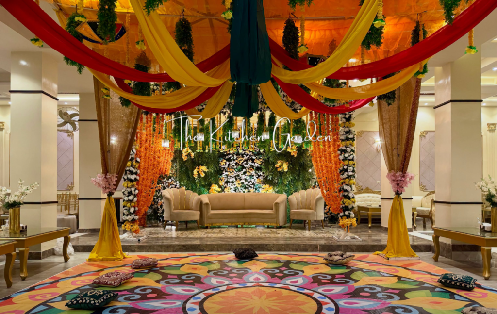 Indoor dining and wedding food arrangement at Kitchen Garden in Sialkot for a family wedding event.