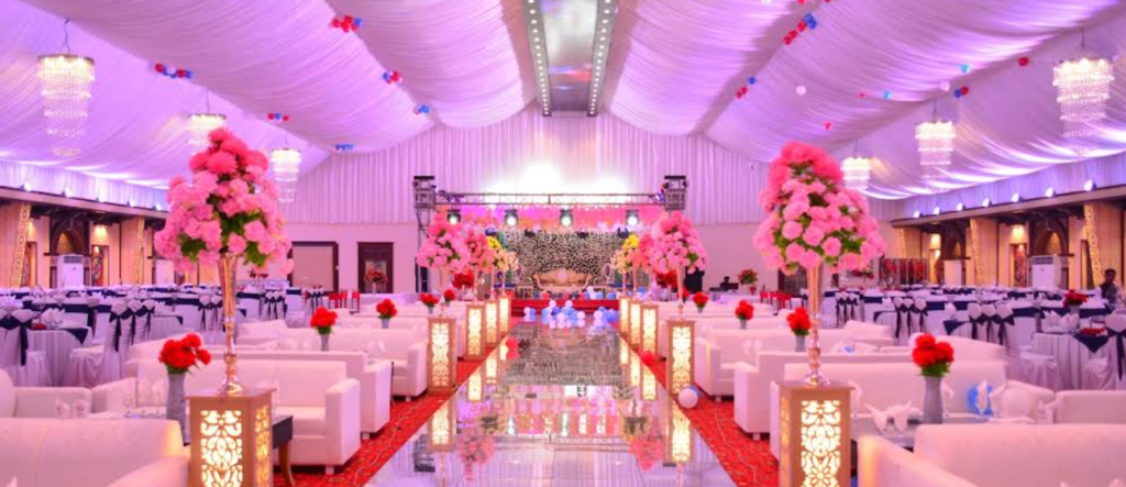 Family wedding event at Tulip Marquee in Sialkot featuring elegant lighting and banquet décor.