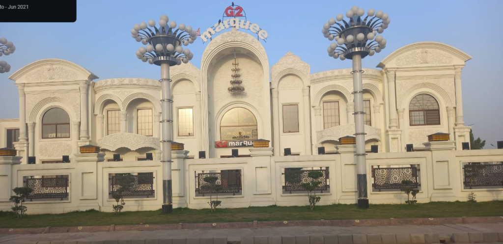 Luxury wedding setup at Grace Marquee G2 in Sialkot with elegant stage décor, chandeliers, and premium seating arrangement. This is one the top among the best marriage halls and marquees in sialkot.
